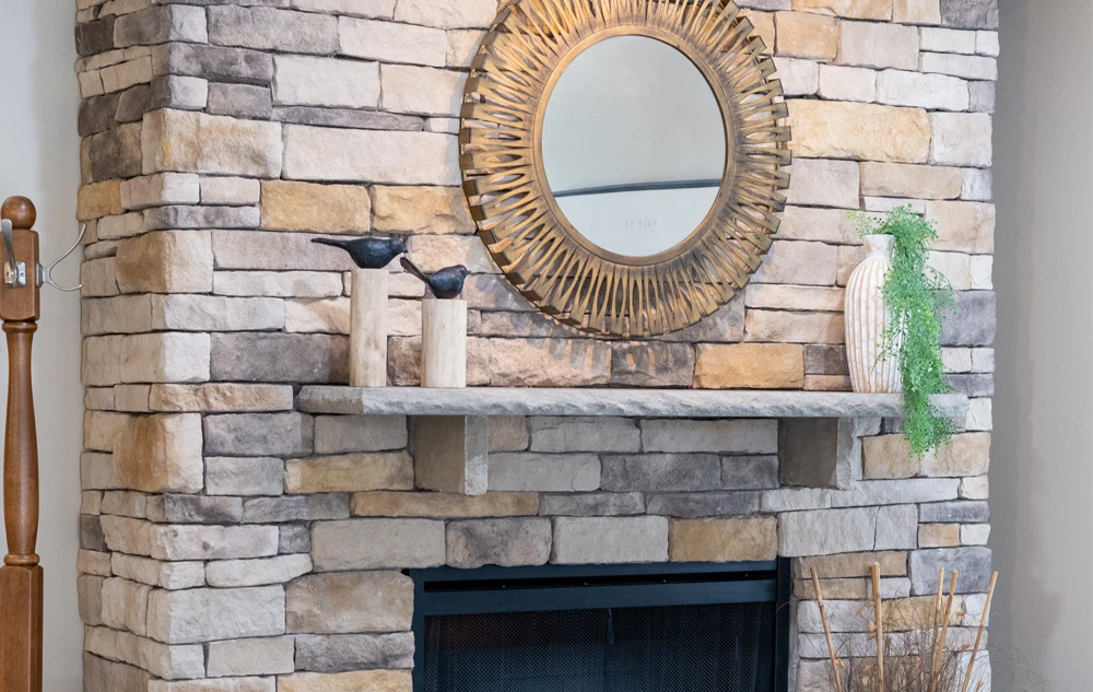 Decorative stone fireplace and warm interior design in creedmoor road dental office