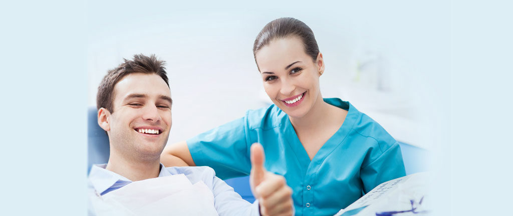 happy patient with dentist